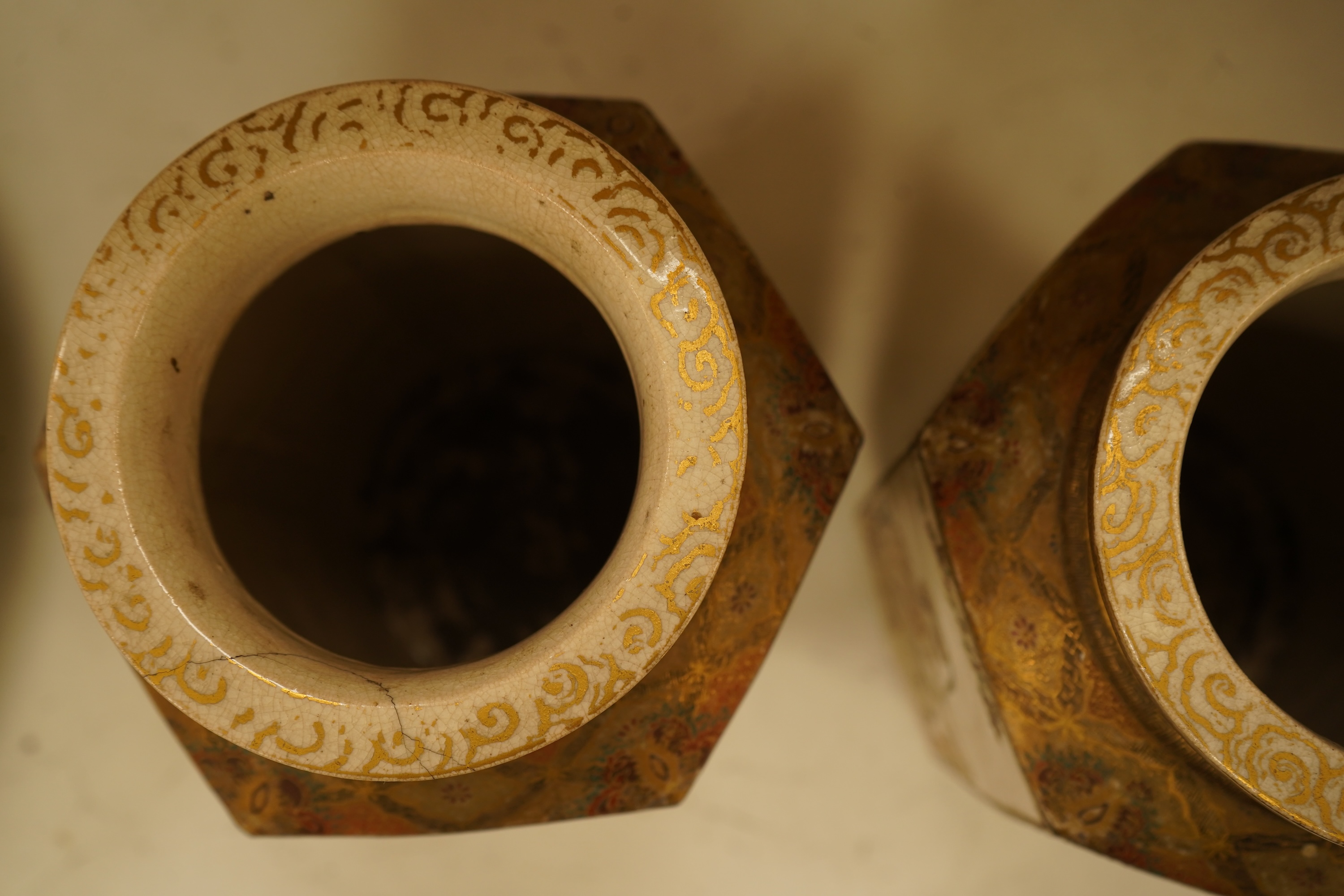 A pair of Japanese Satsuma 'rakan' vases, Meiji period, 26cm high